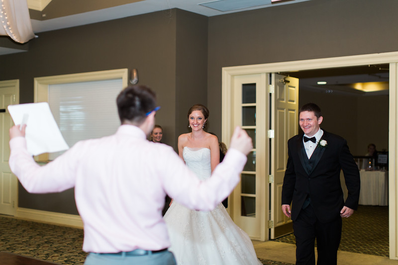 Wedding DJ Nick Vera coordinating with vendors at a Chicago reception — Impulse Entertainment