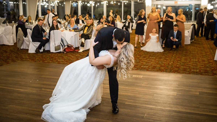 Romantic wedding first dance with spotlight lighting