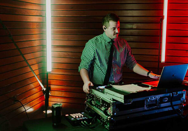 Wedding DJ reading the crowd and mixing music live